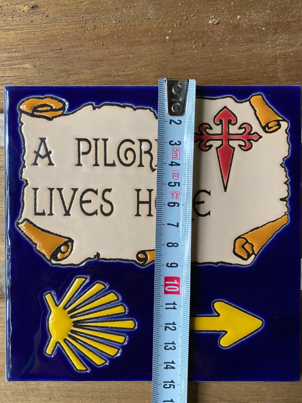 "A Pilgrim Lives Here" tile