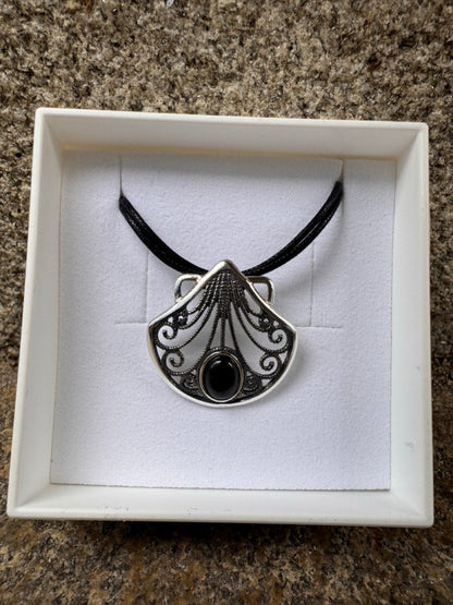 Silver Shell pendant with Jet Stone