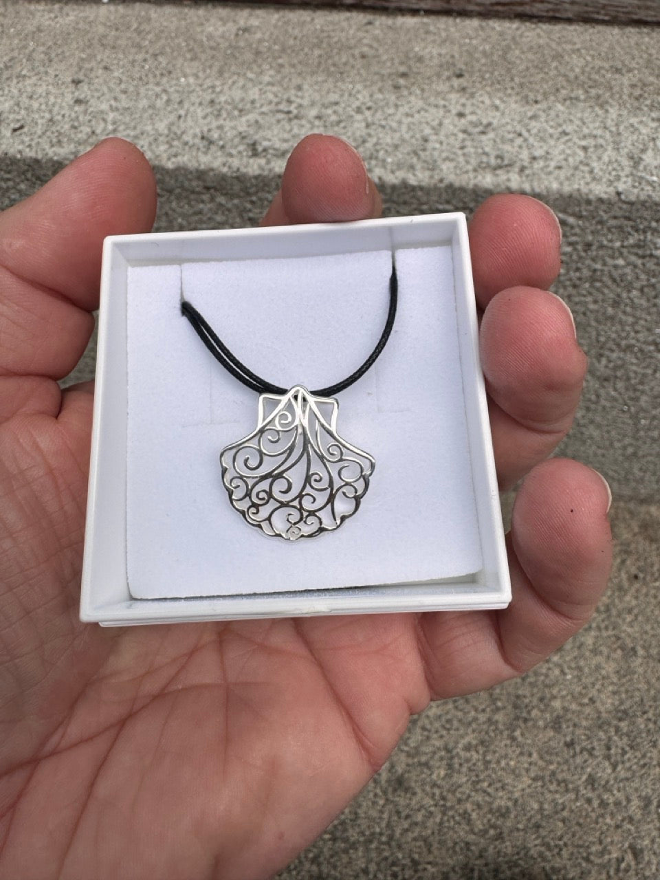 Silver Shell with curvy design