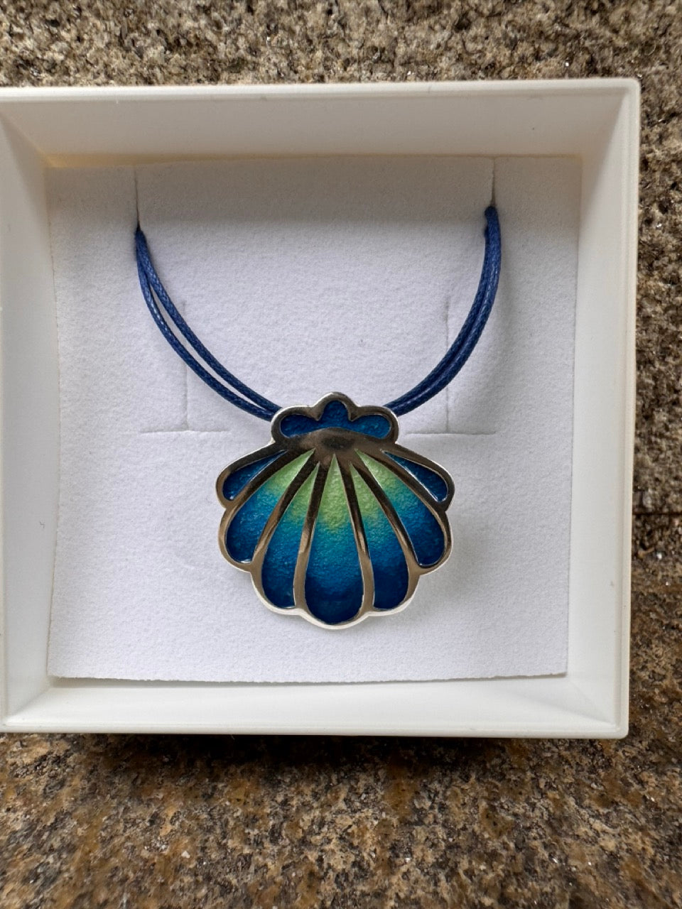 Silver Shell with Green to blue colour