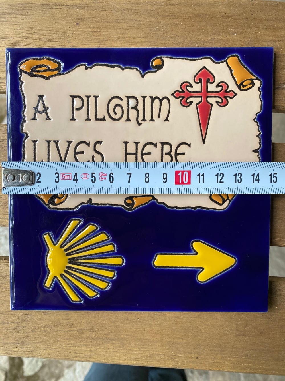 "A Pilgrim Lives Here" tile